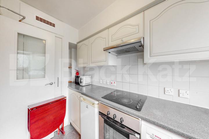 Top floor private development with charming balcony, communal gardens & parking Towergate , Pages Walk 